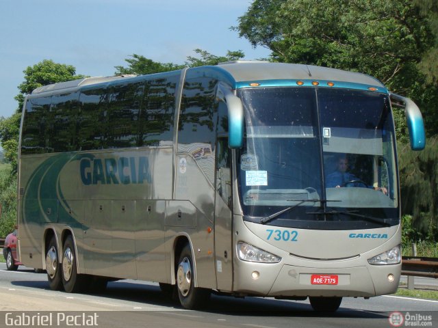 Viação Garcia 7302 na cidade de Queimados, Rio de Janeiro, Brasil, por Gabriel Peclat. Número da foto: #184140.